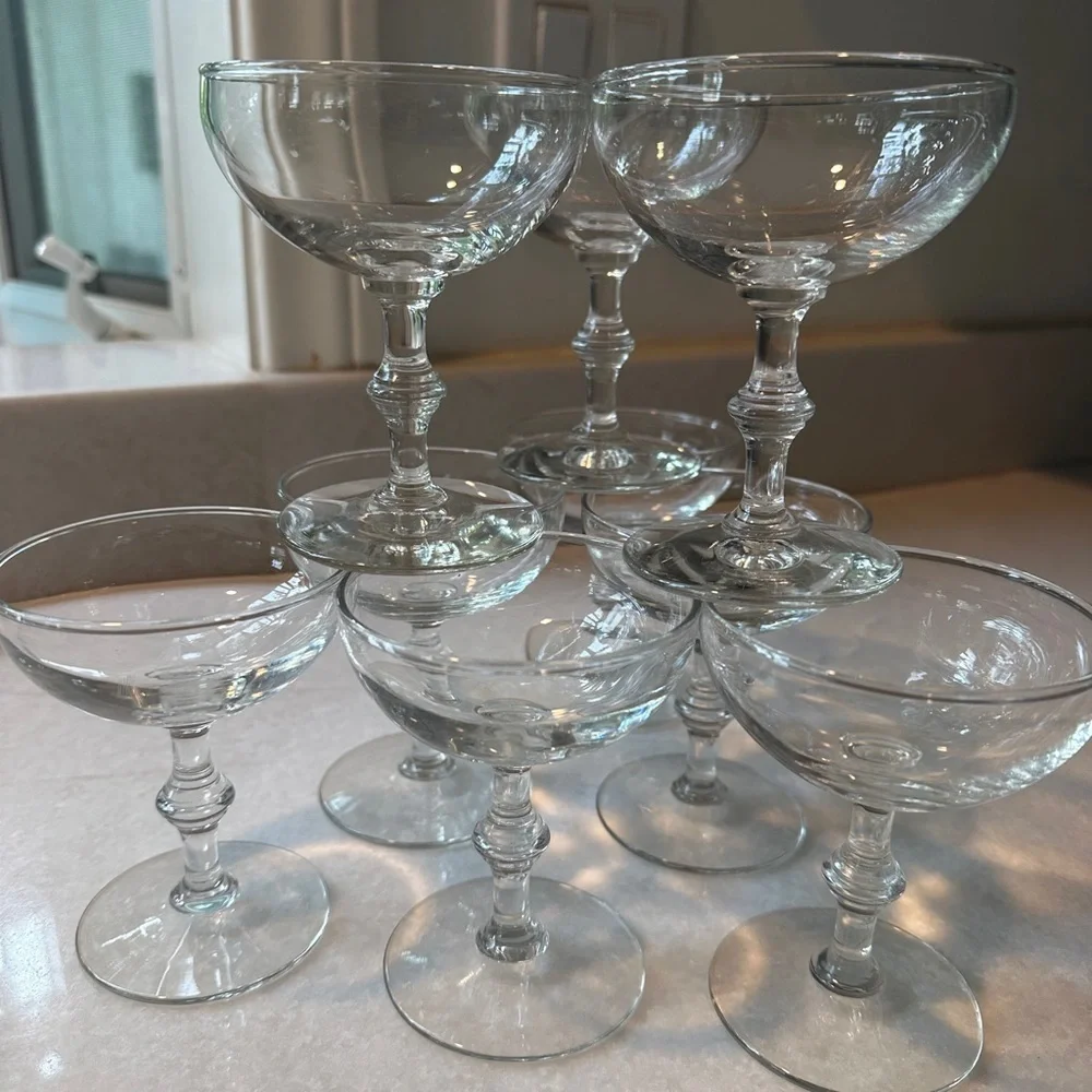 Set of 9 vintage champagne glasses.